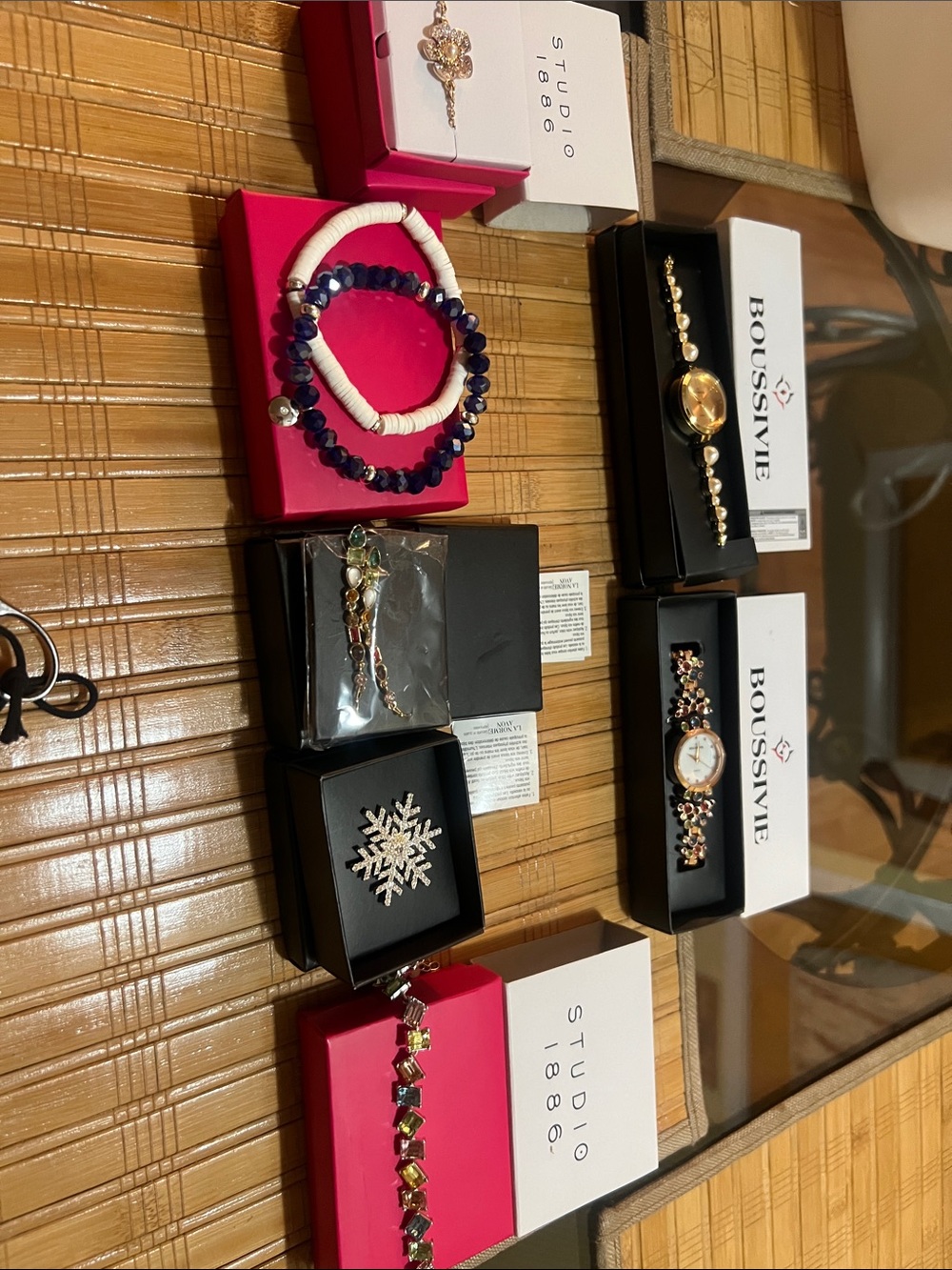 A assortment of custom jewelry by Boussive & Studio 1886